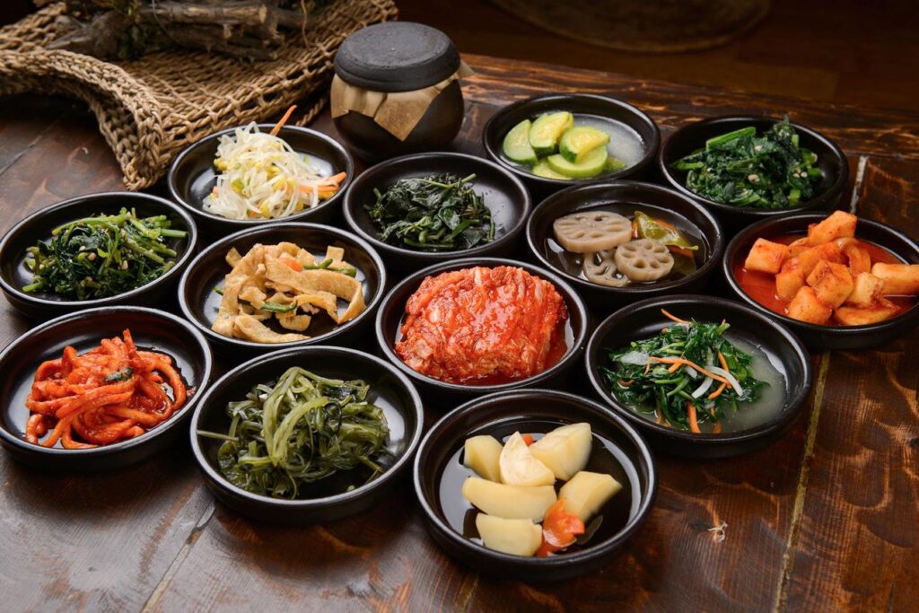 Korean banchan side dishes served in small bowls