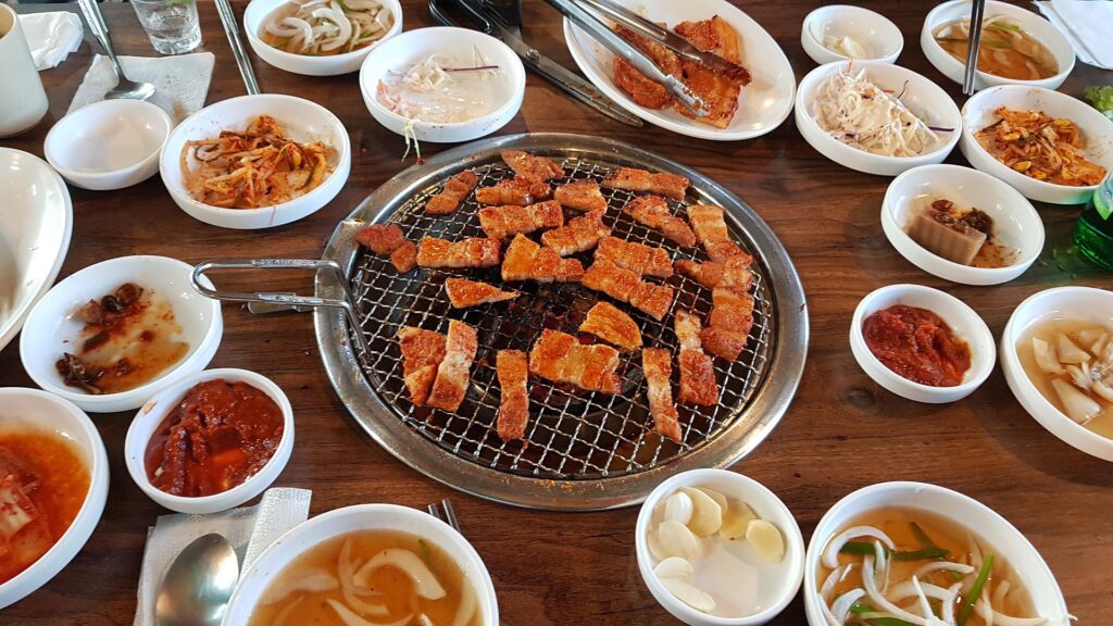 Korean BBQ grilled meat at restaurant table